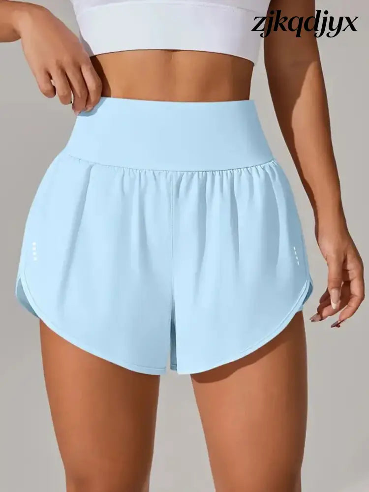 Pocketed High Waist Active Shorts - Light Blue / XS